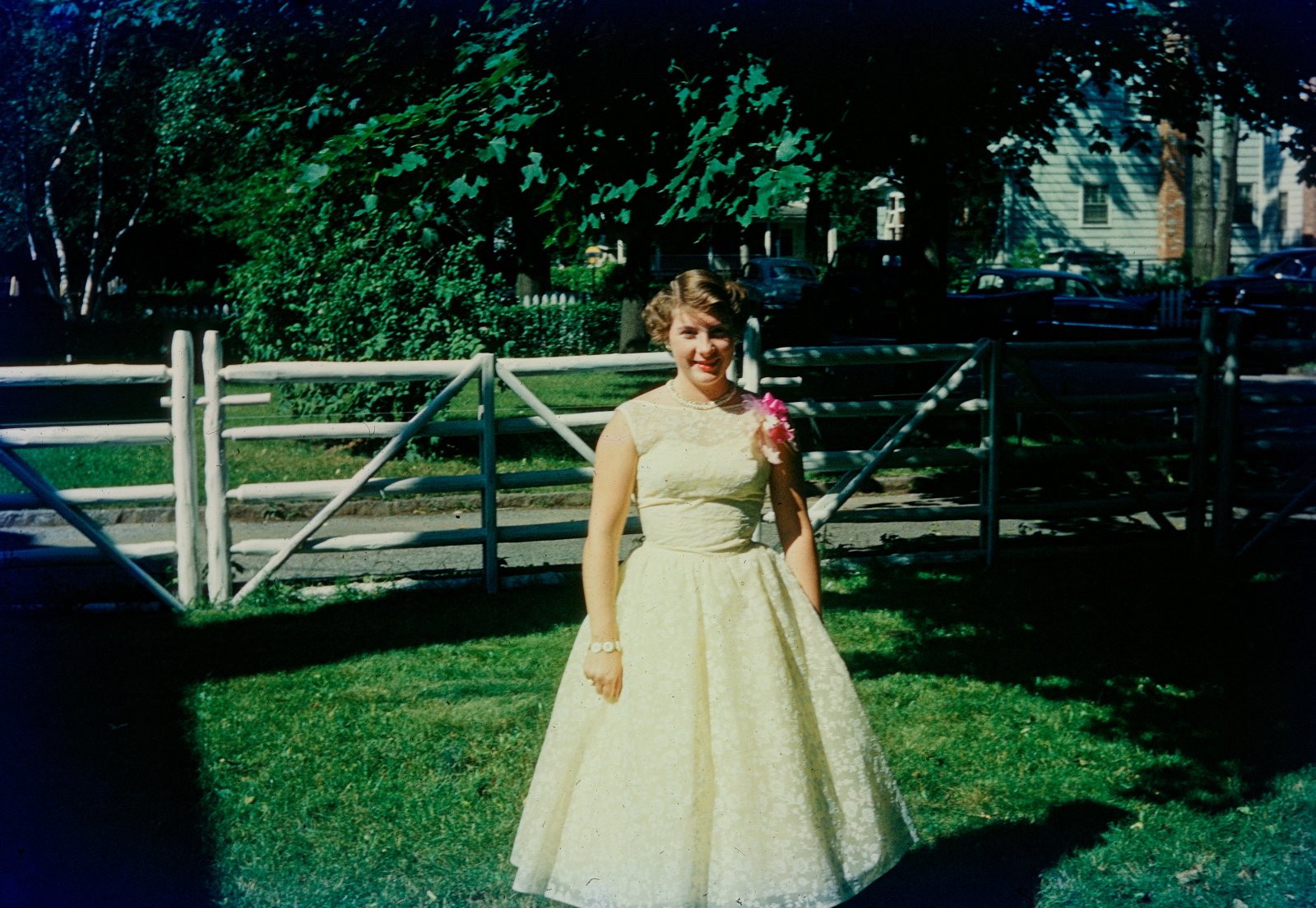 Young Woman standing in front of the Gate