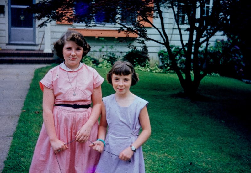 Sisters on the front lawn