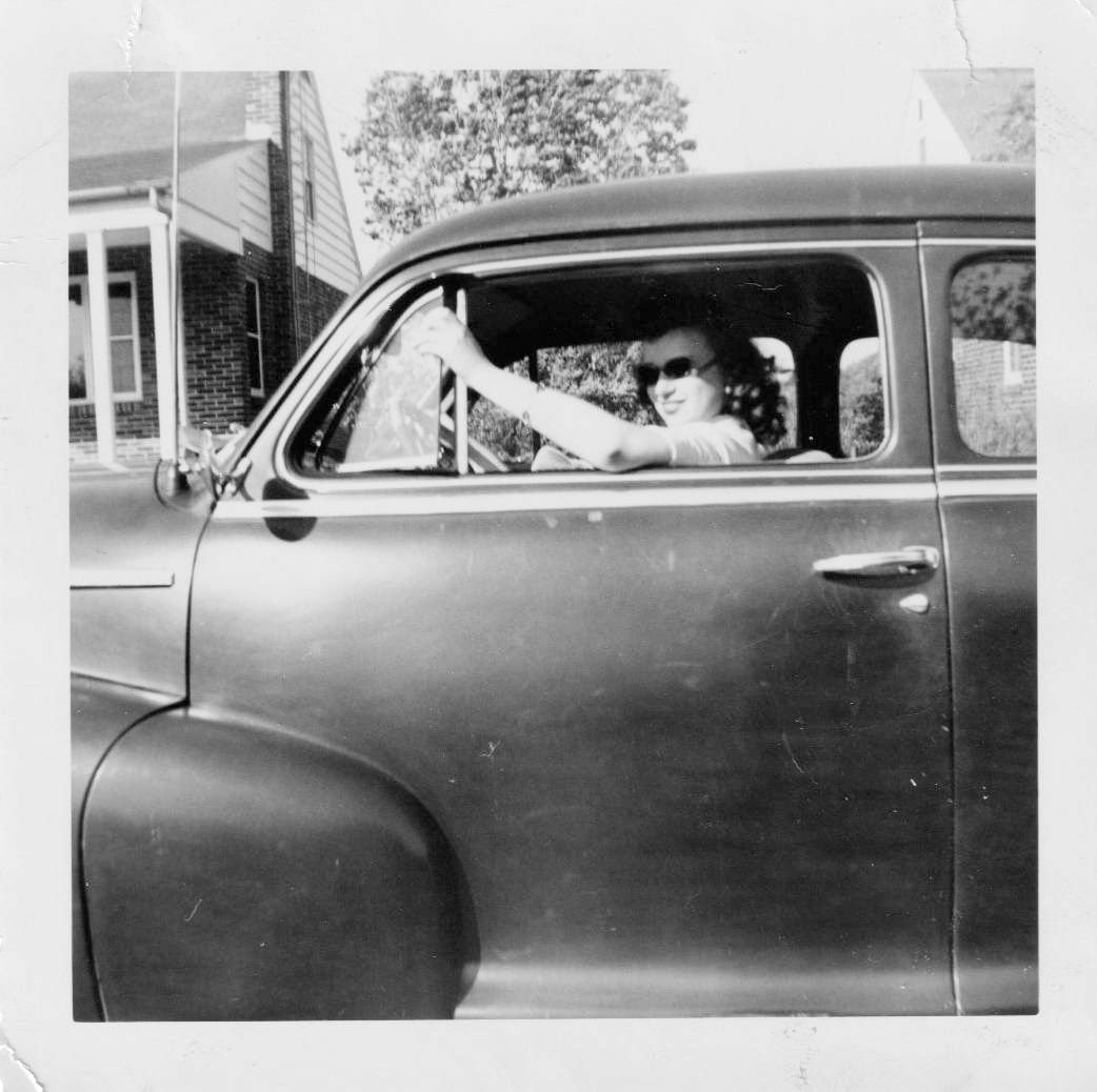 Sunglasses and a Sedan