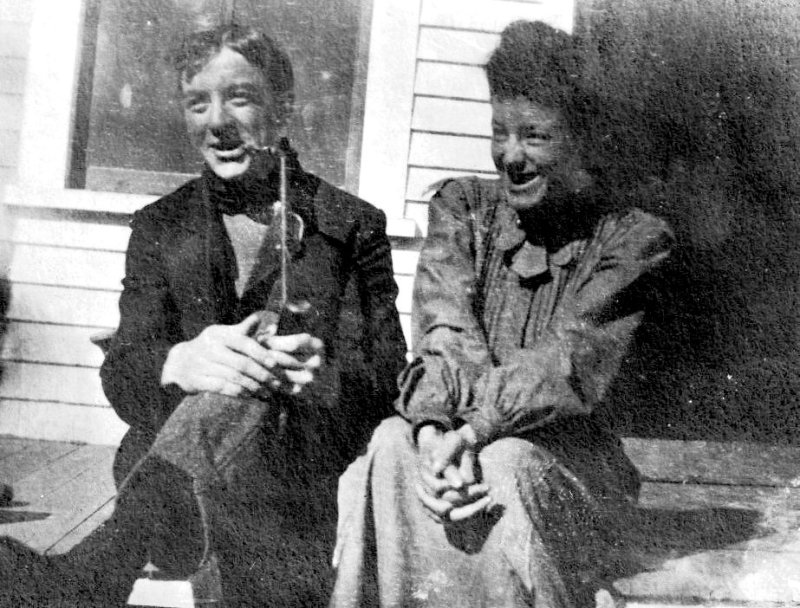 A Laughing Couple on the Porch