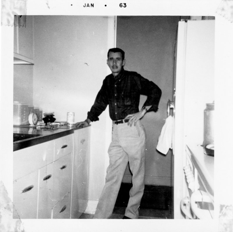 Young Man in the Kitchen Doorway