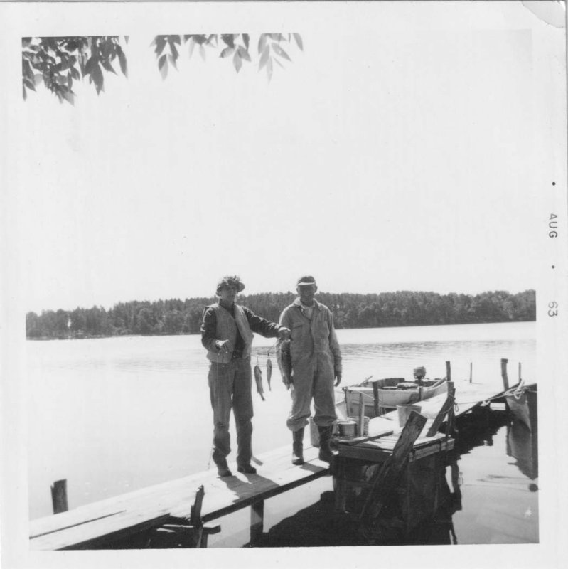 Two Men with the Day's Catch